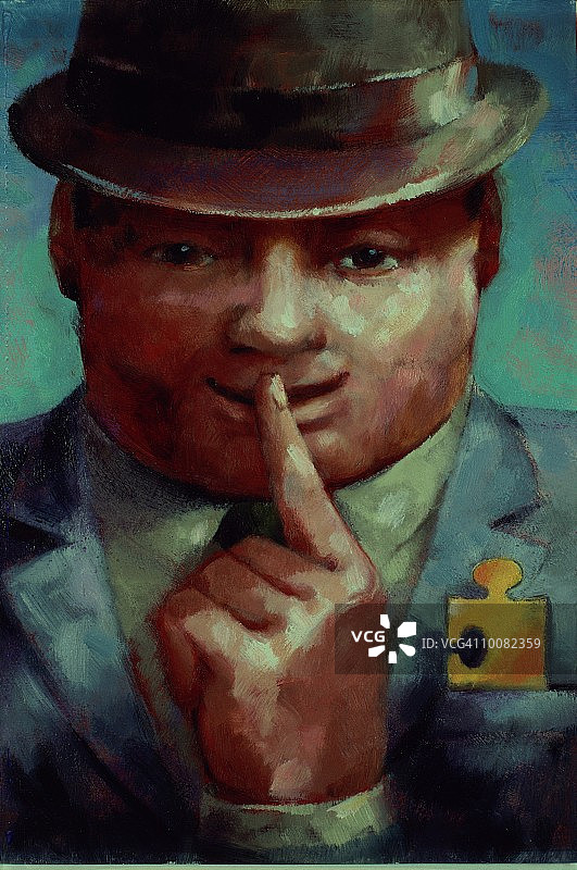 拿着拼图的神秘男人图片素材