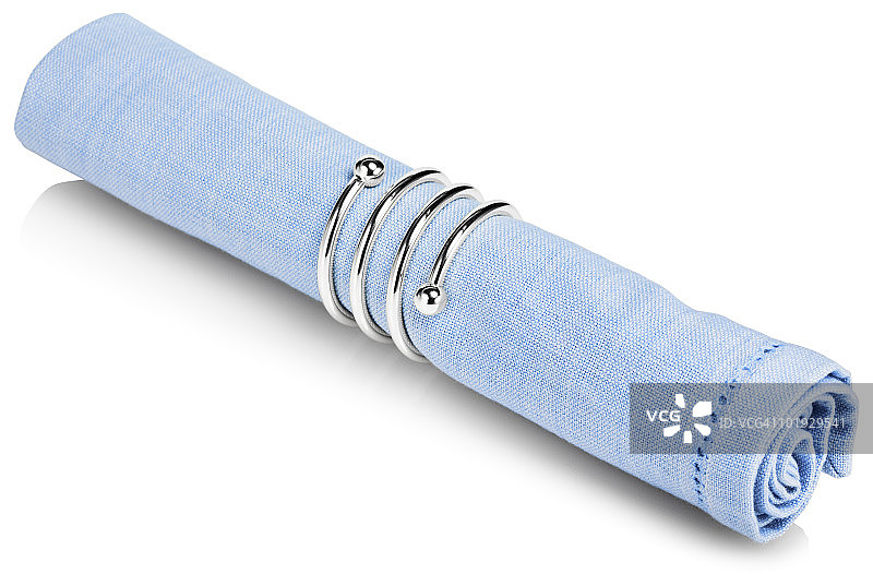 带金属餐巾环的布餐巾图片素材