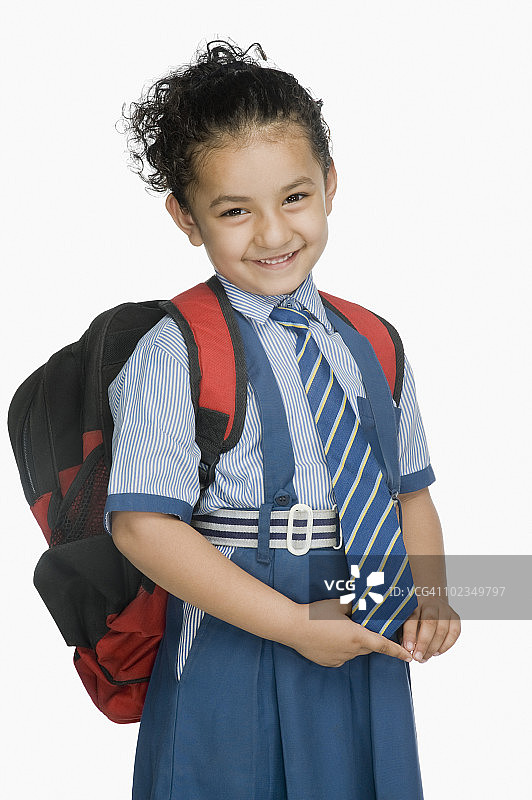 微笑背书包的女学生肖像图片素材