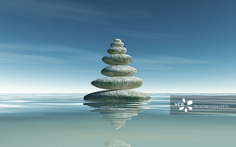 平静海面上的石金字塔图片素材