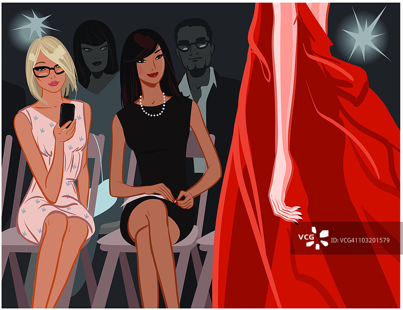 人们在时装秀上观看模特走秀图片素材