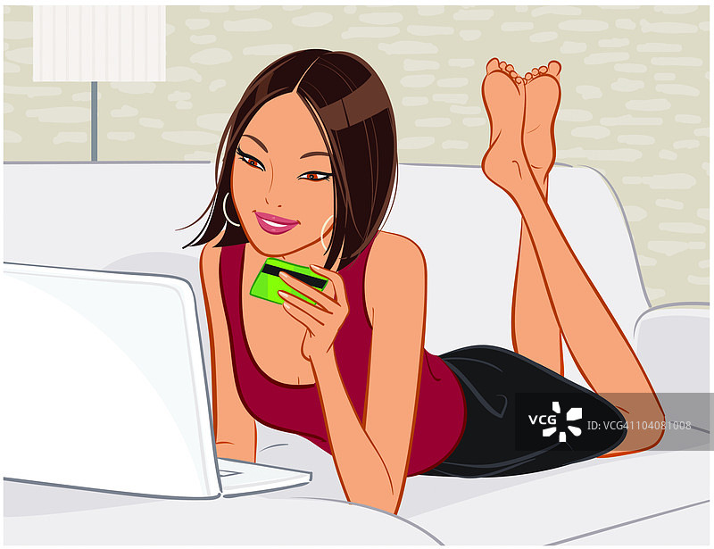 持信用卡进行在线购物的女性图片素材