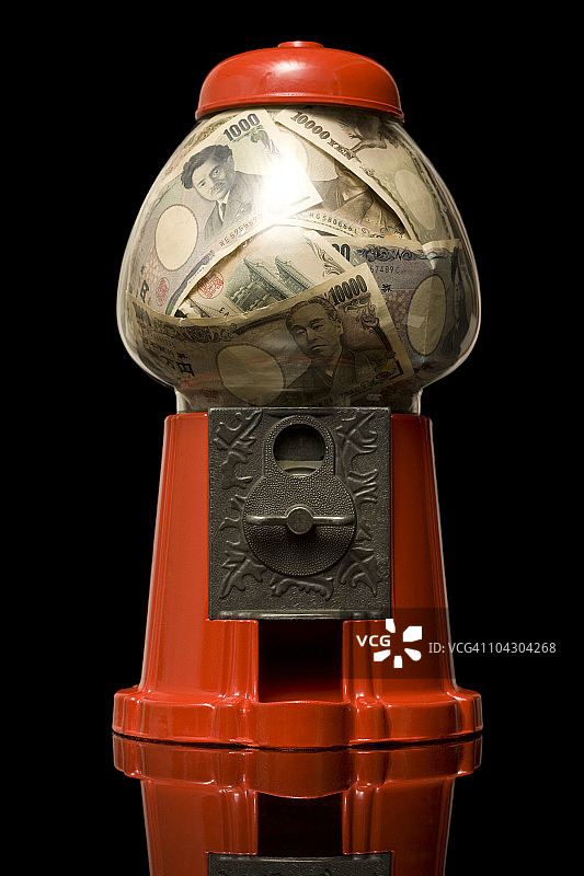 装满钱的泡泡糖机图片素材