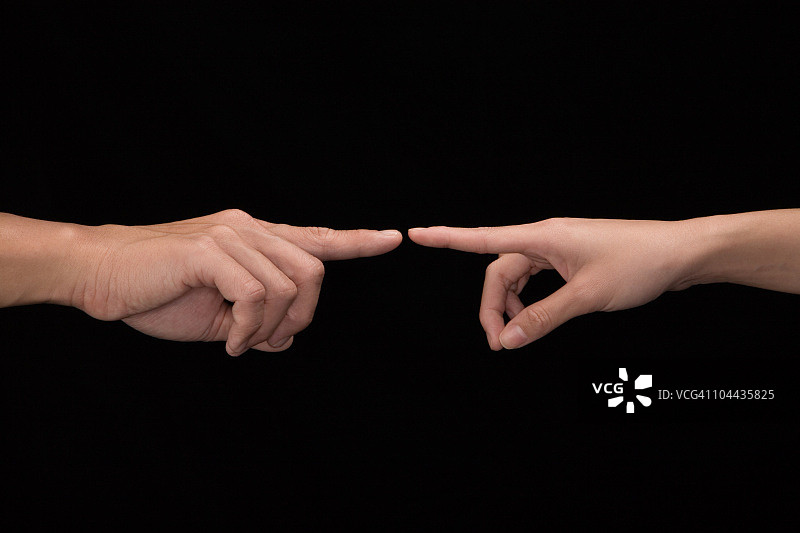 两只食指相互接触的手图片素材