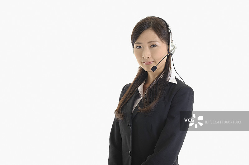 戴着耳机的女商人 портрет图片素材