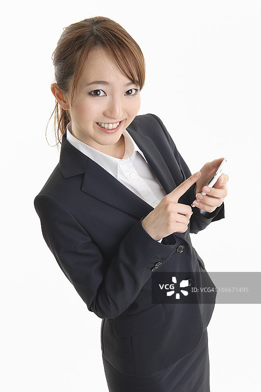 触摸智能手机的女商人图片素材