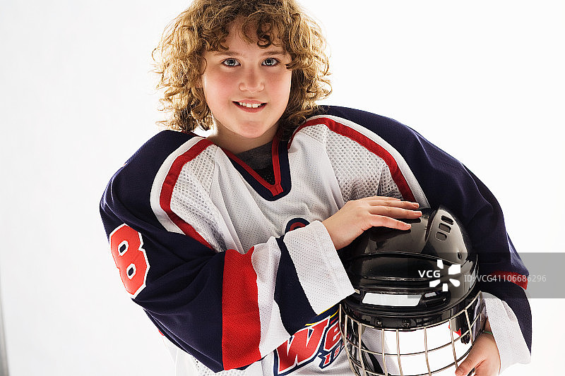身穿冰球服的年轻女孩图片素材