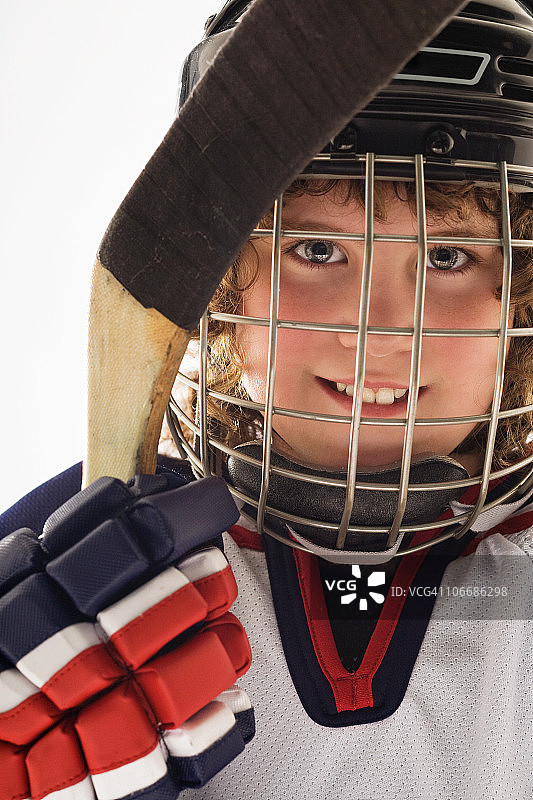 穿着冰球服的年轻女孩特写图片素材