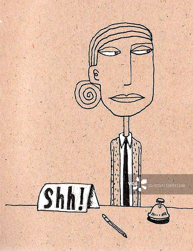 拿着“安静！”标牌的图书管理员图片素材