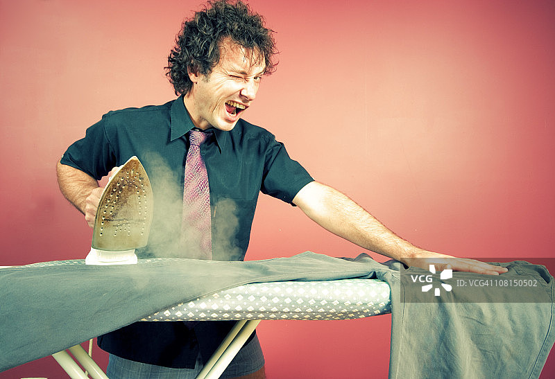 熨衣服图片素材