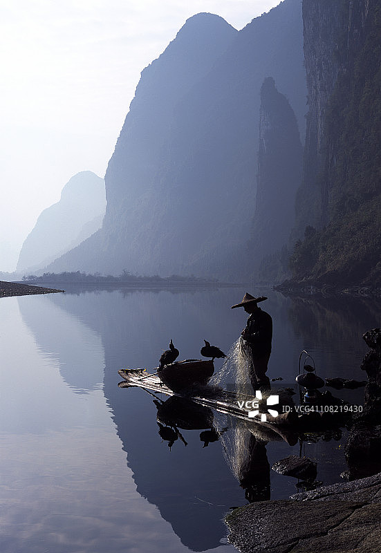 渔民和鸬鹚图片素材