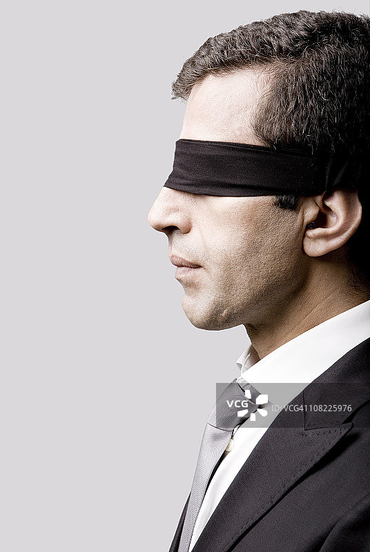 蒙眼的商人图片素材