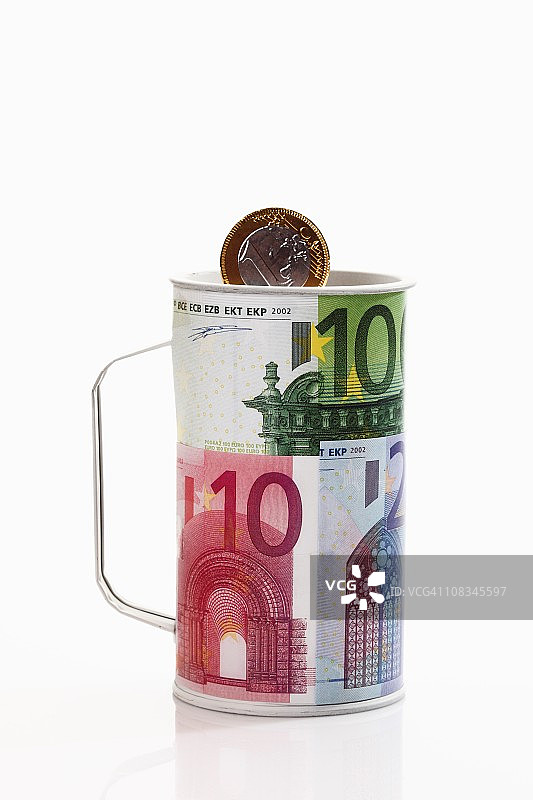 慈善罐与欧元硬币特写图片素材