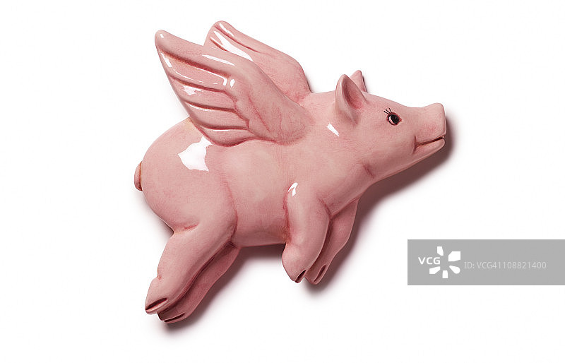 白色背景上的粉色瓷飞猪图片素材