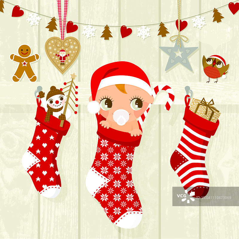 挂在衣架上的圣诞宝宝图片素材