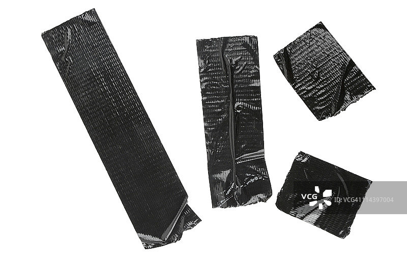 白色背景上的黑色胶带碎片图片素材