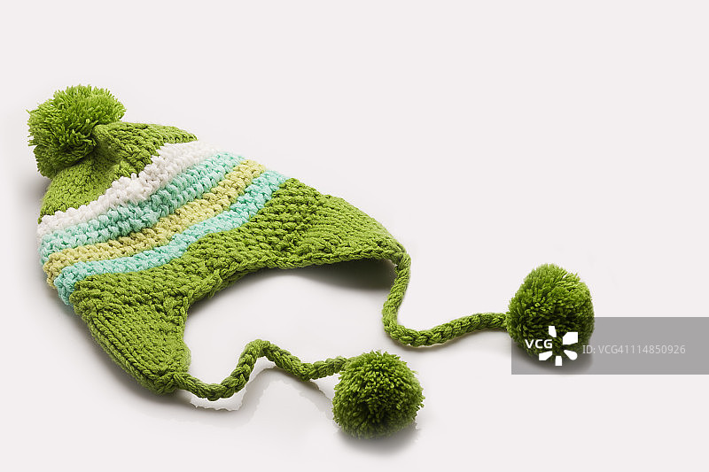 绿白羊毛帽图片素材