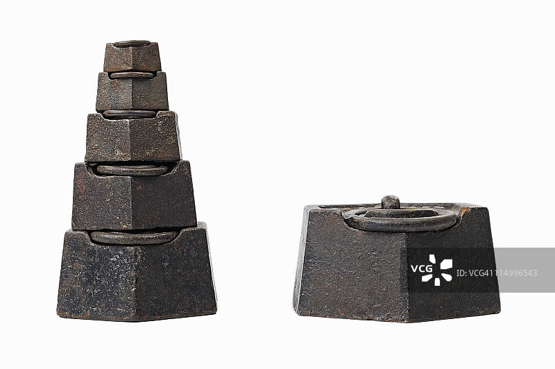 两公斤重物与一堆较小重物图片素材