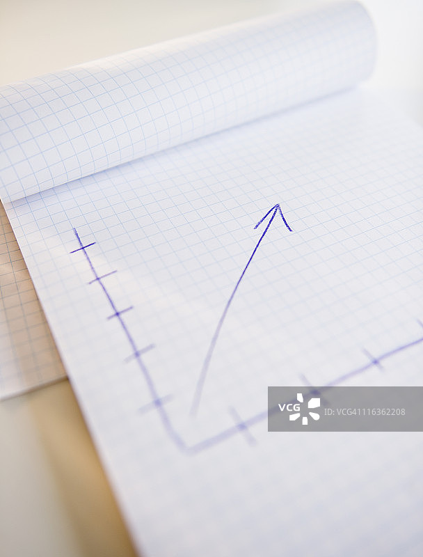 带箭头图的笔记本摄影棚照片图片素材