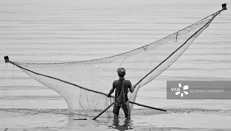 渔夫和渔网图片素材