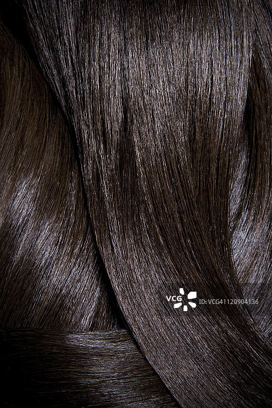 有光泽的深棕色头发特写图片素材