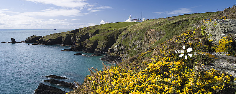 豪塞尔湾通往蜥蜴灯塔的崎岖海岸线图片素材