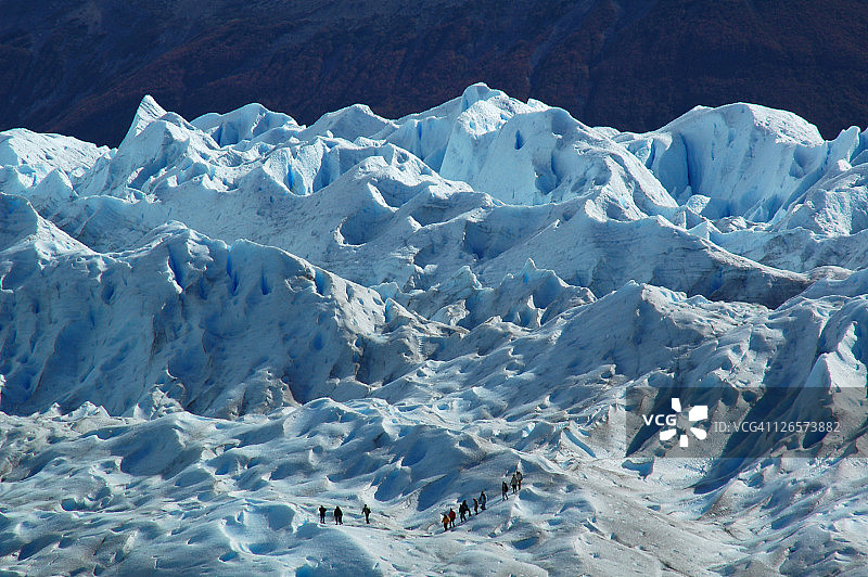 冰川徒步者，阿根廷莫雷诺冰川图片素材