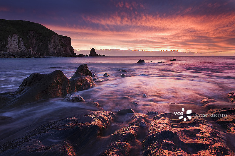 英国南德文郡班瑟姆海滩的日落图片素材