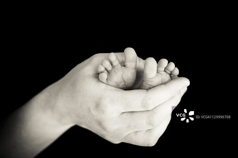 手托小脚丫图片素材