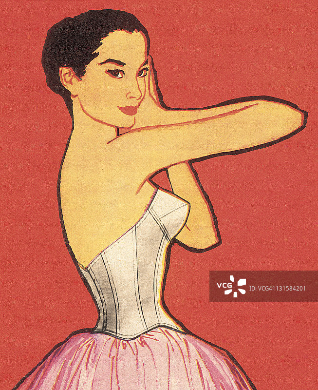 身穿粉色连衣裙的深色头发女人图片素材