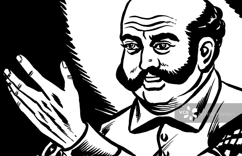 秃头男子看着他的手图片素材