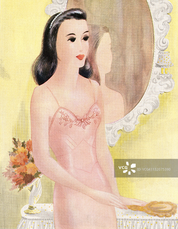 穿着粉色吊带裙的女人图片素材