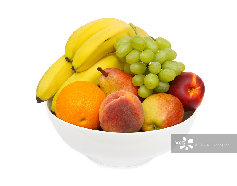 白色碗中堆满的美味新鲜水果图片素材