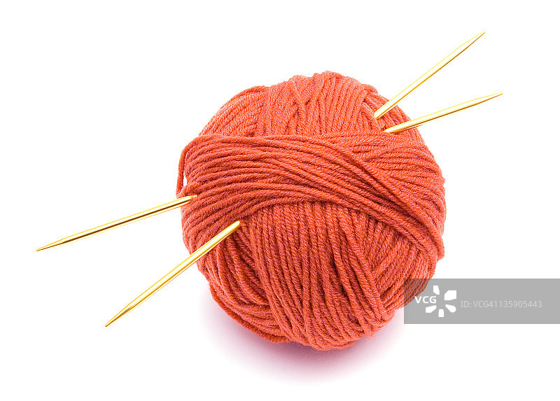 红色毛线球和针织针图片素材