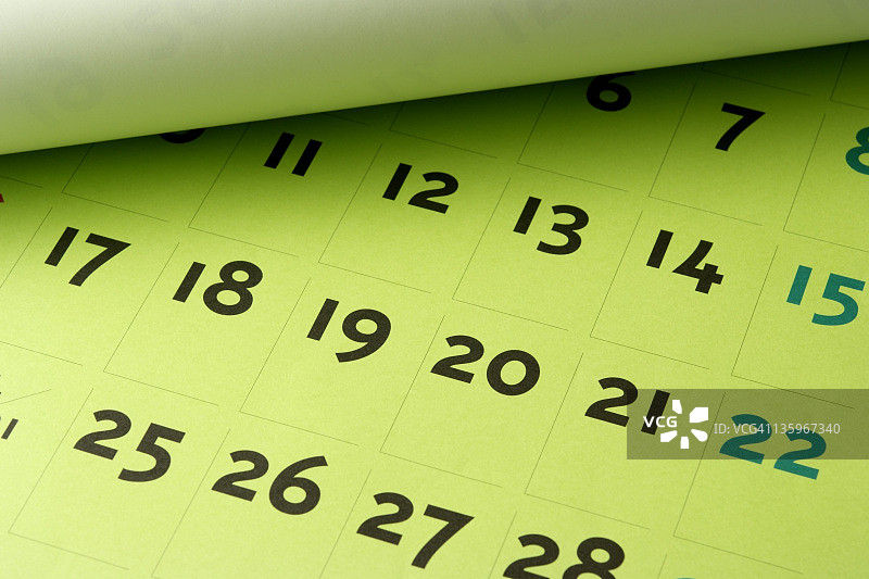 打开的绿色日历特写图片素材