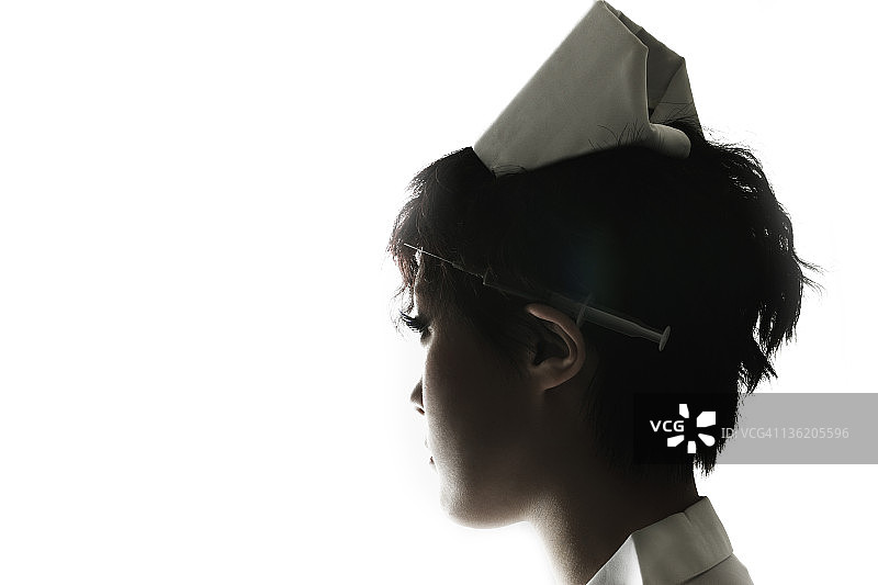 戴着注射器的护士图片素材