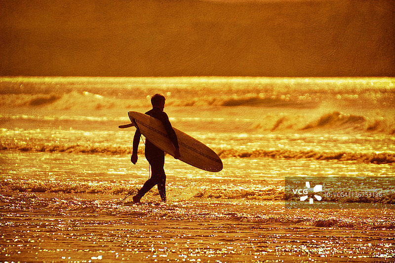 日落冲浪者图片素材