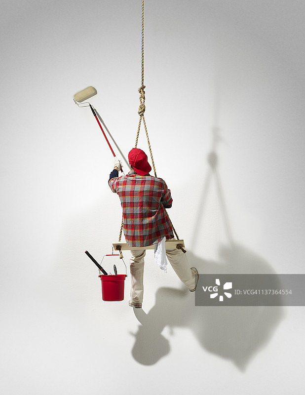 悬挂着的油漆匠图片素材