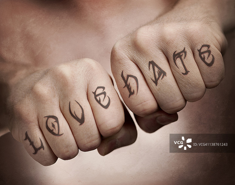 爱与恨的拳头纹身图片素材