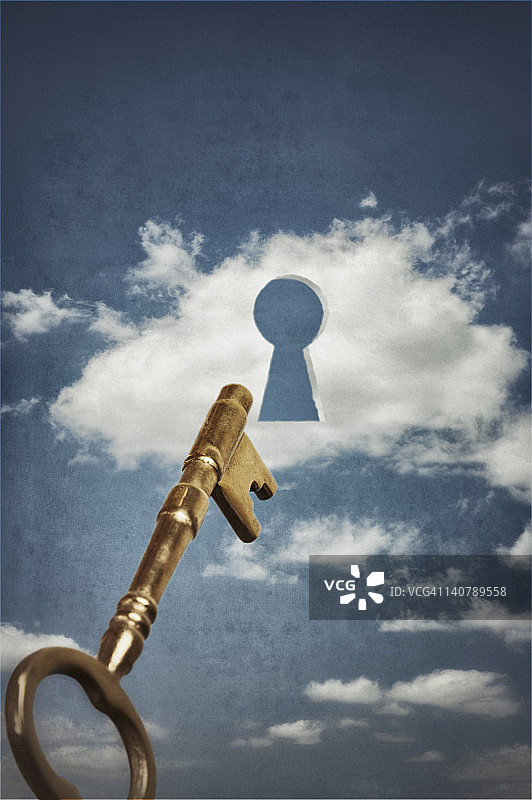 进入带钥匙孔的云朵的骷髅钥匙图片素材