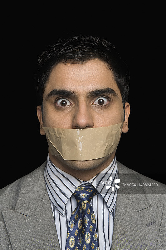 被堵嘴的商人肖像图片素材