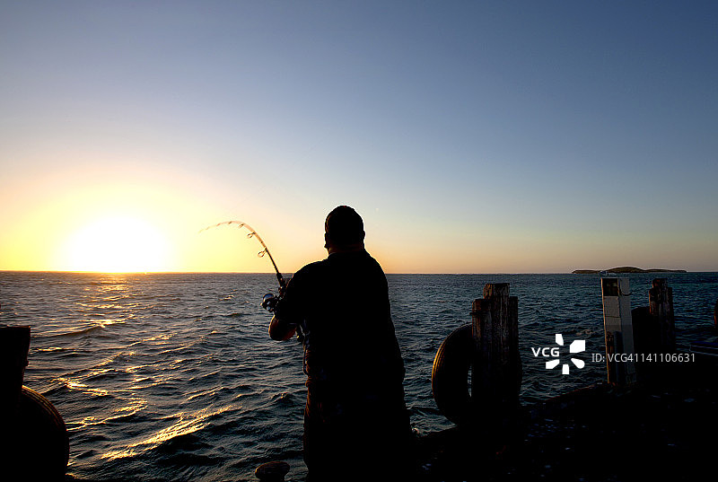 在西澳大利亚钓鱼的太阳图片素材