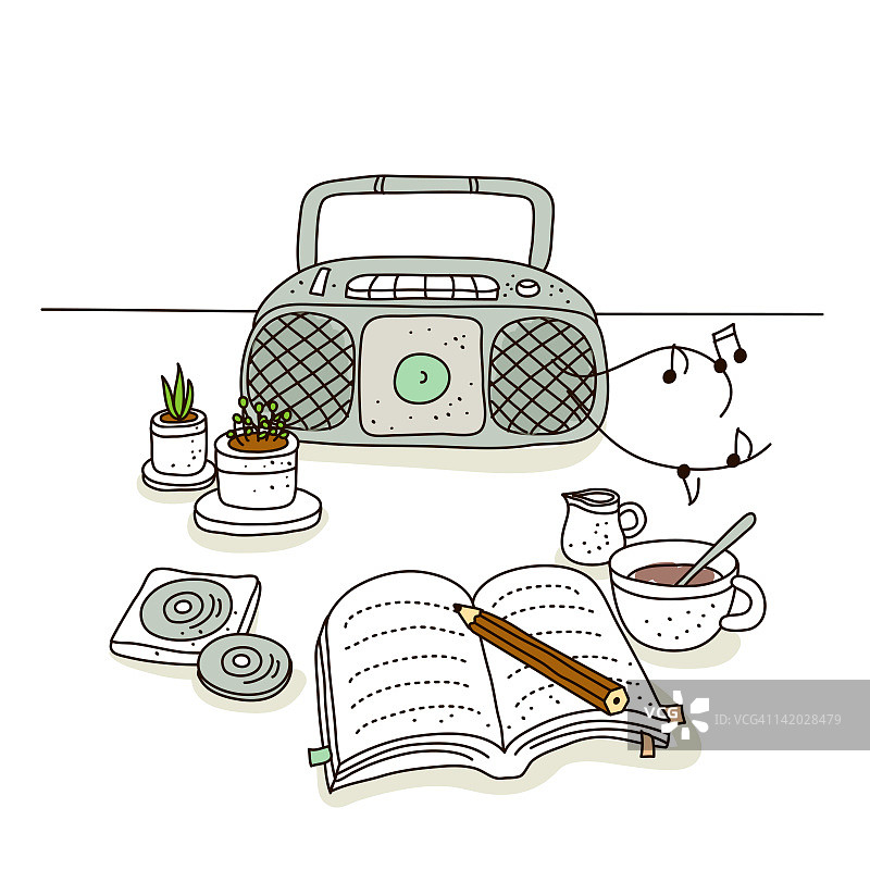 茶和盆栽植物，背景是便携式立体声音响图片素材