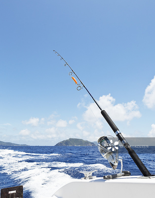 用于深海捕鱼的钓竿和渔线轮图片素材