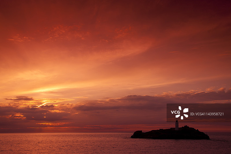 日落时分的戈德雷维灯塔图片素材