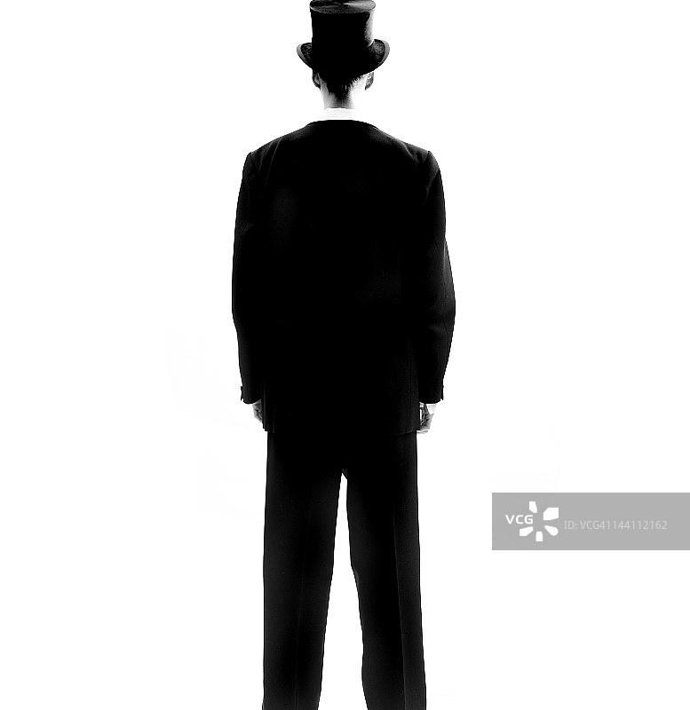 身穿黑色西装和帽子的女人图片素材