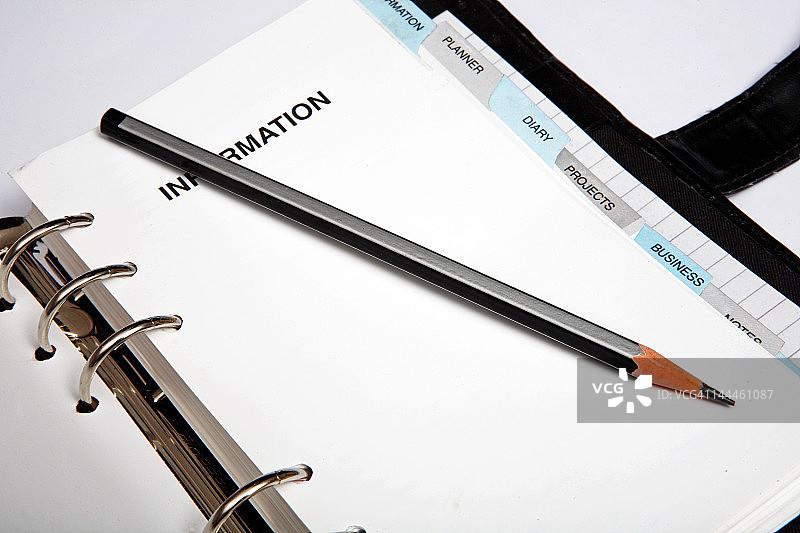 笔记本上的铅笔图片素材