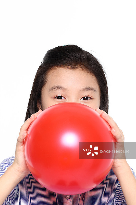 女孩吹气球图片素材