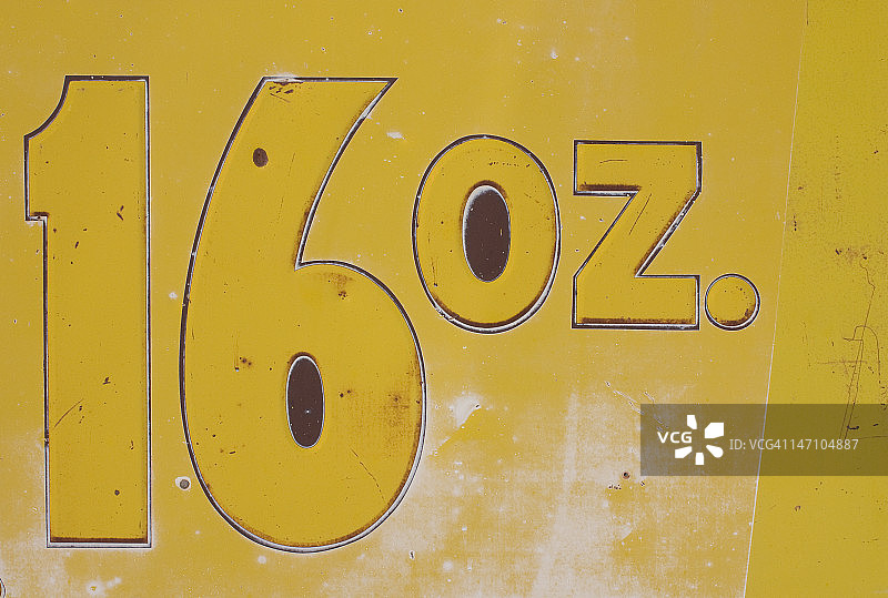 老式古董16盎司“Lotta Cola”金属标志图片素材