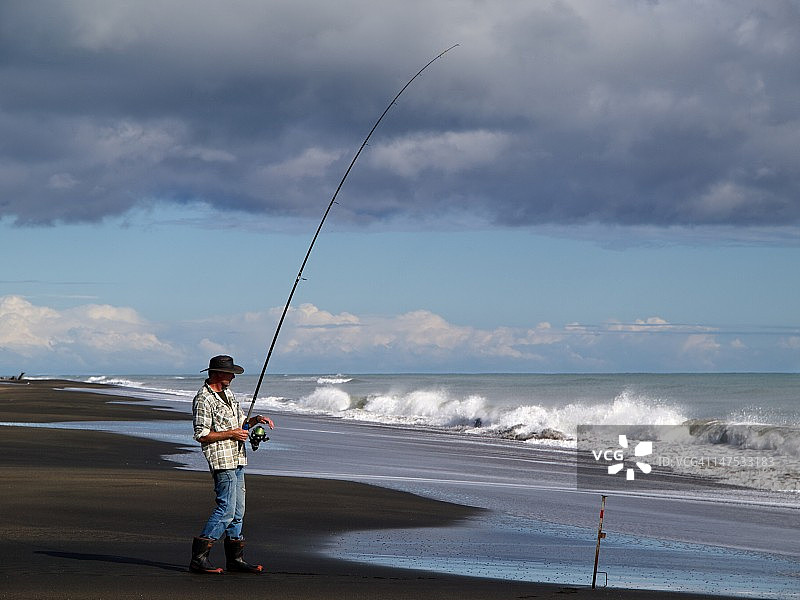 新西兰海滩钓鱼图片素材